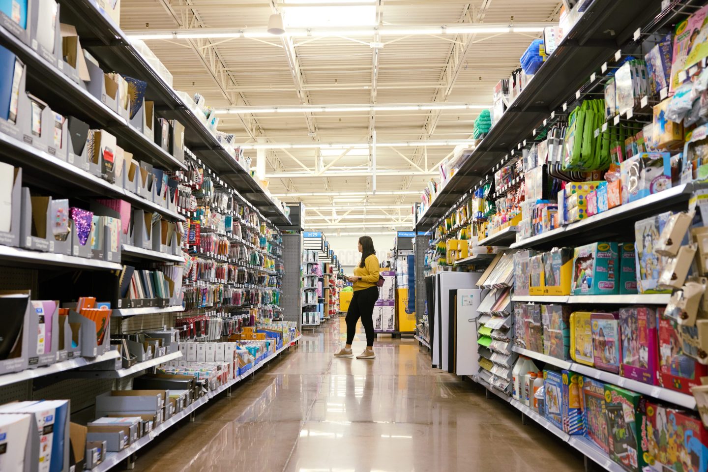 A woman shopping inside a Walmart