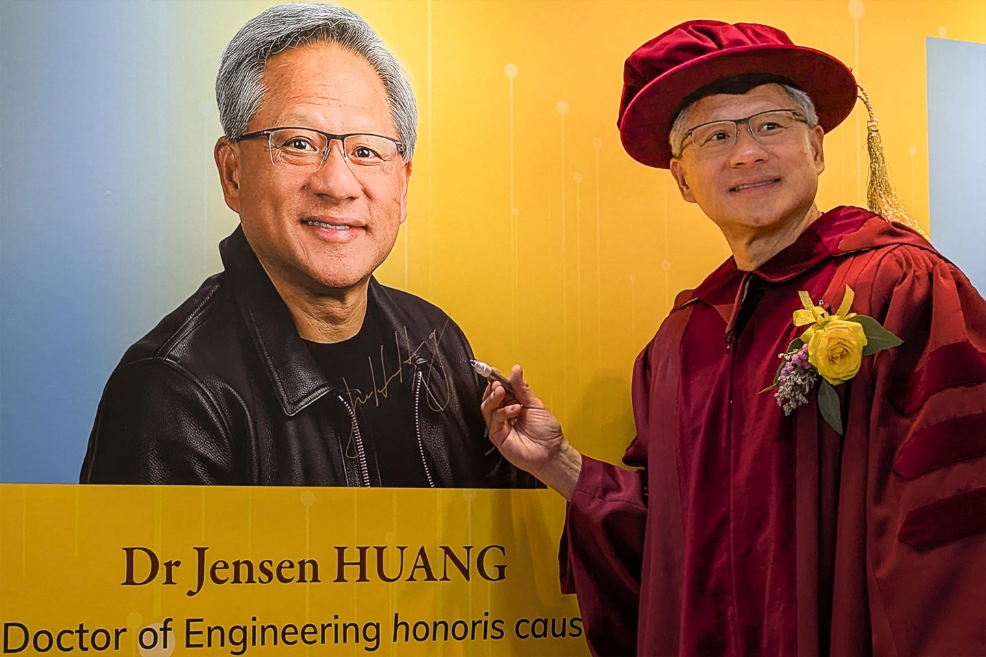 Jensen Huang wears graduation regalia next to a photo of himself.