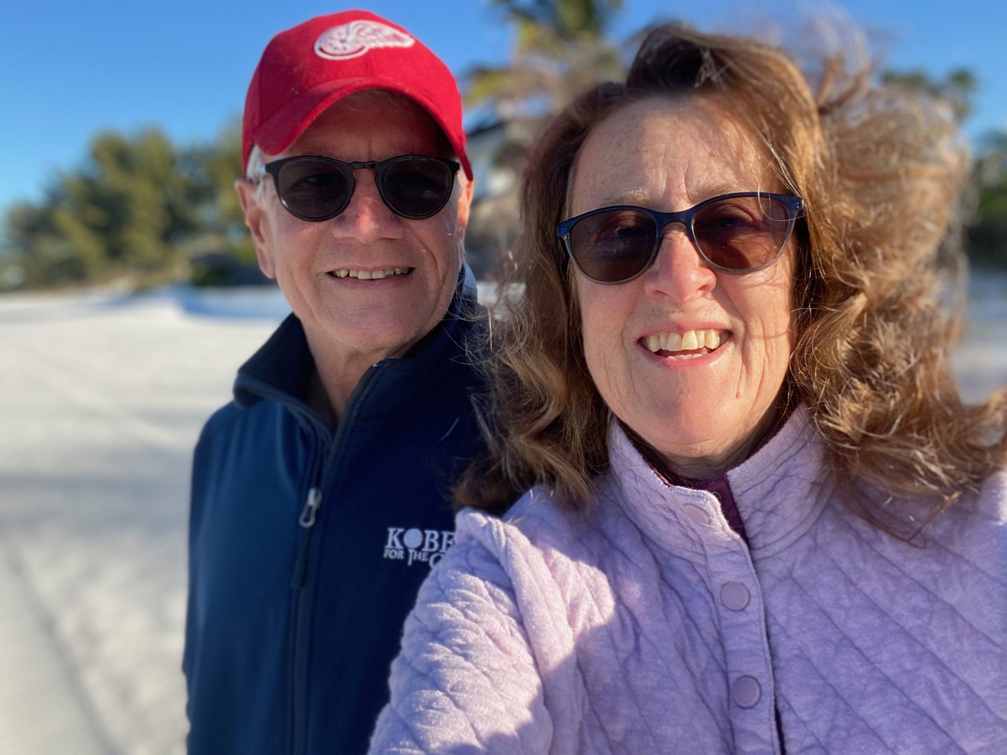 A man and woman take a selfie of themselves.